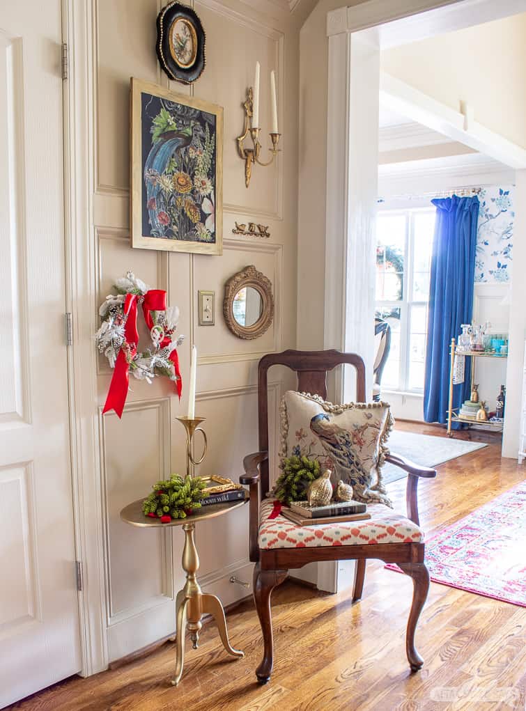 gallery wall overlooking a dining room