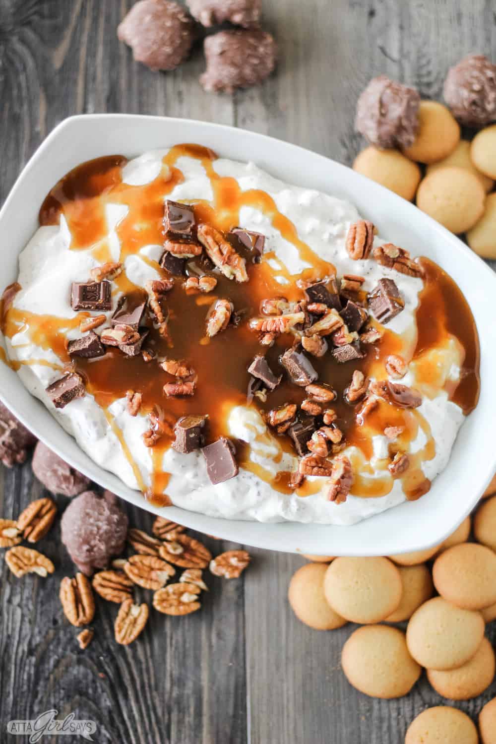 cookie dip in a bowl with Nilla Wafers and turtle chocolate candy 