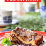 chocolate french toast stuffed with hazelnut spread on a red rimmed plate