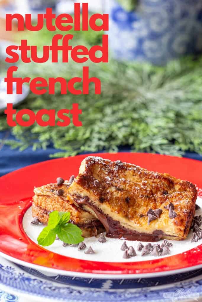 chocolate french toast stuffed with hazelnut spread on a red rimmed plate