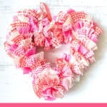 heart shaped wreath made from Valentine's Day cupcake liners