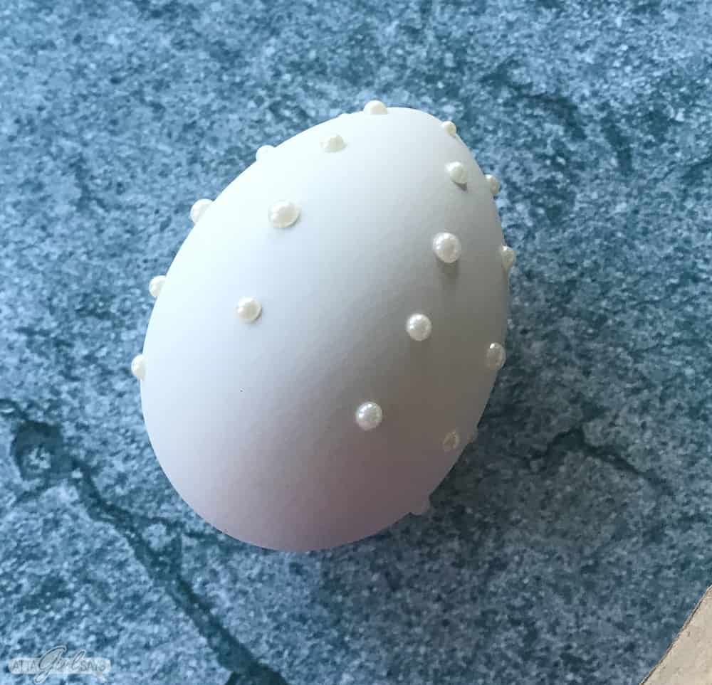 craft egg with self adhesive pearls on it
