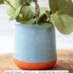 DIY La Fermiere French yogurt jar filled with eucalpytus and lavender on a wooden charger