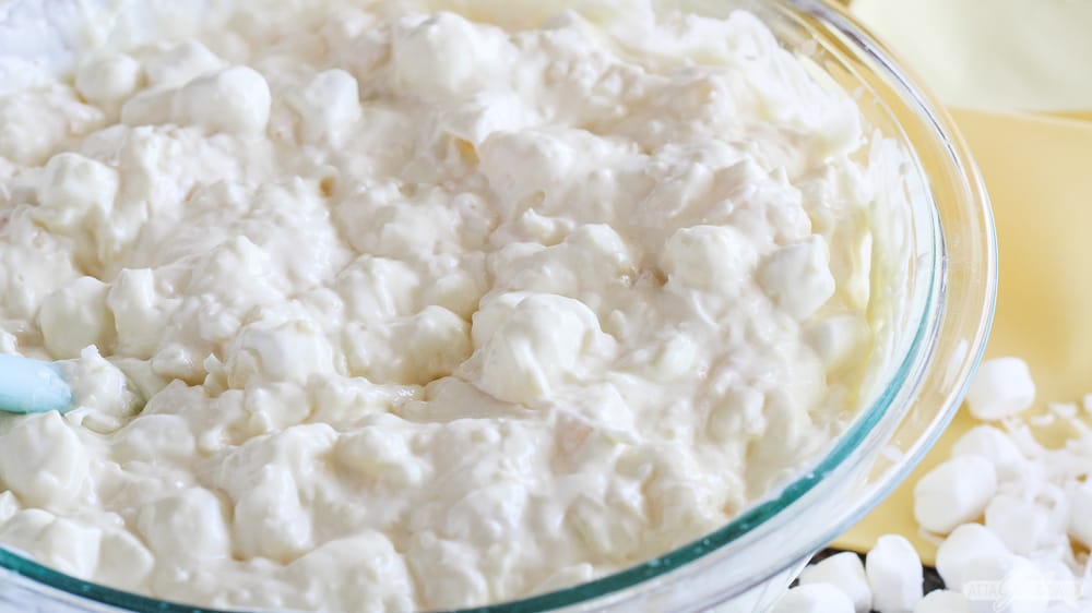 pineapple fluff dessert in a glass bowl