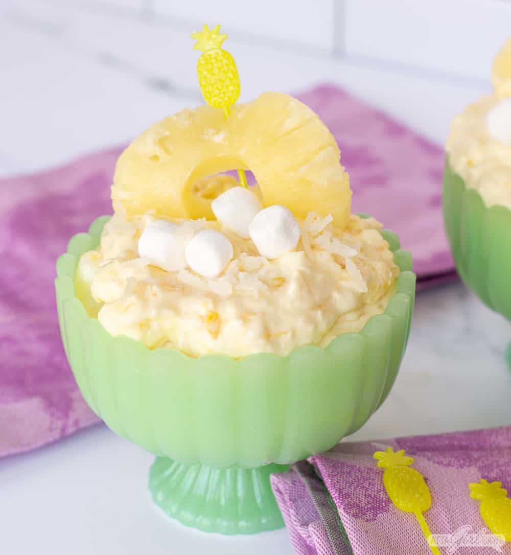 pineapple fluff with marshmallows in a green bowl
