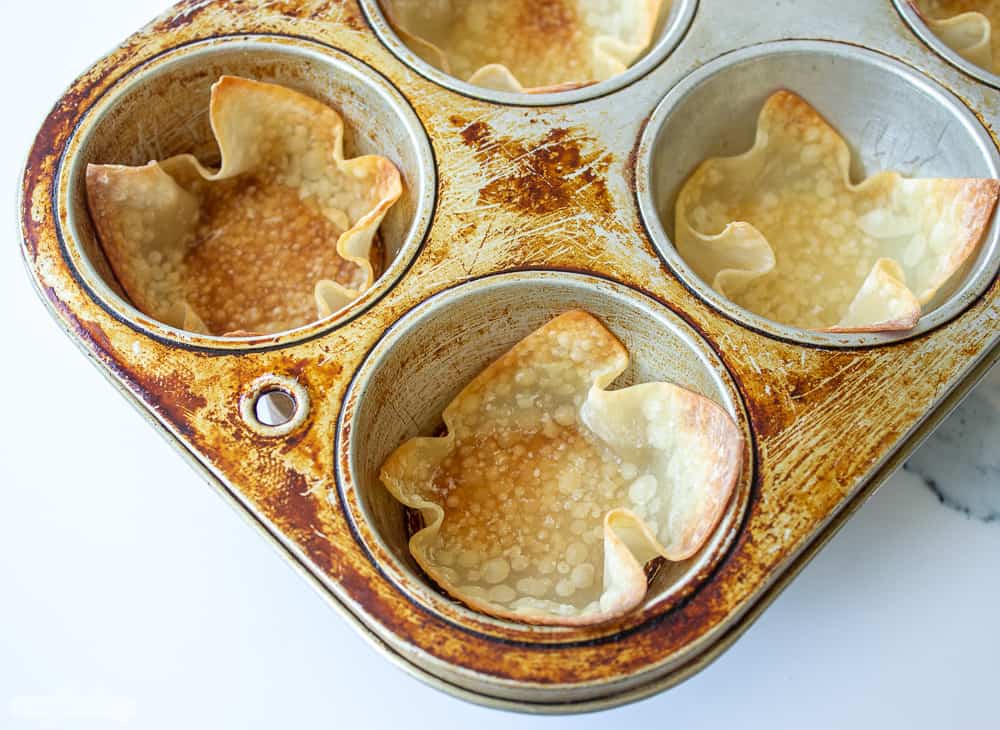 cirspy wontons in a muffin pan