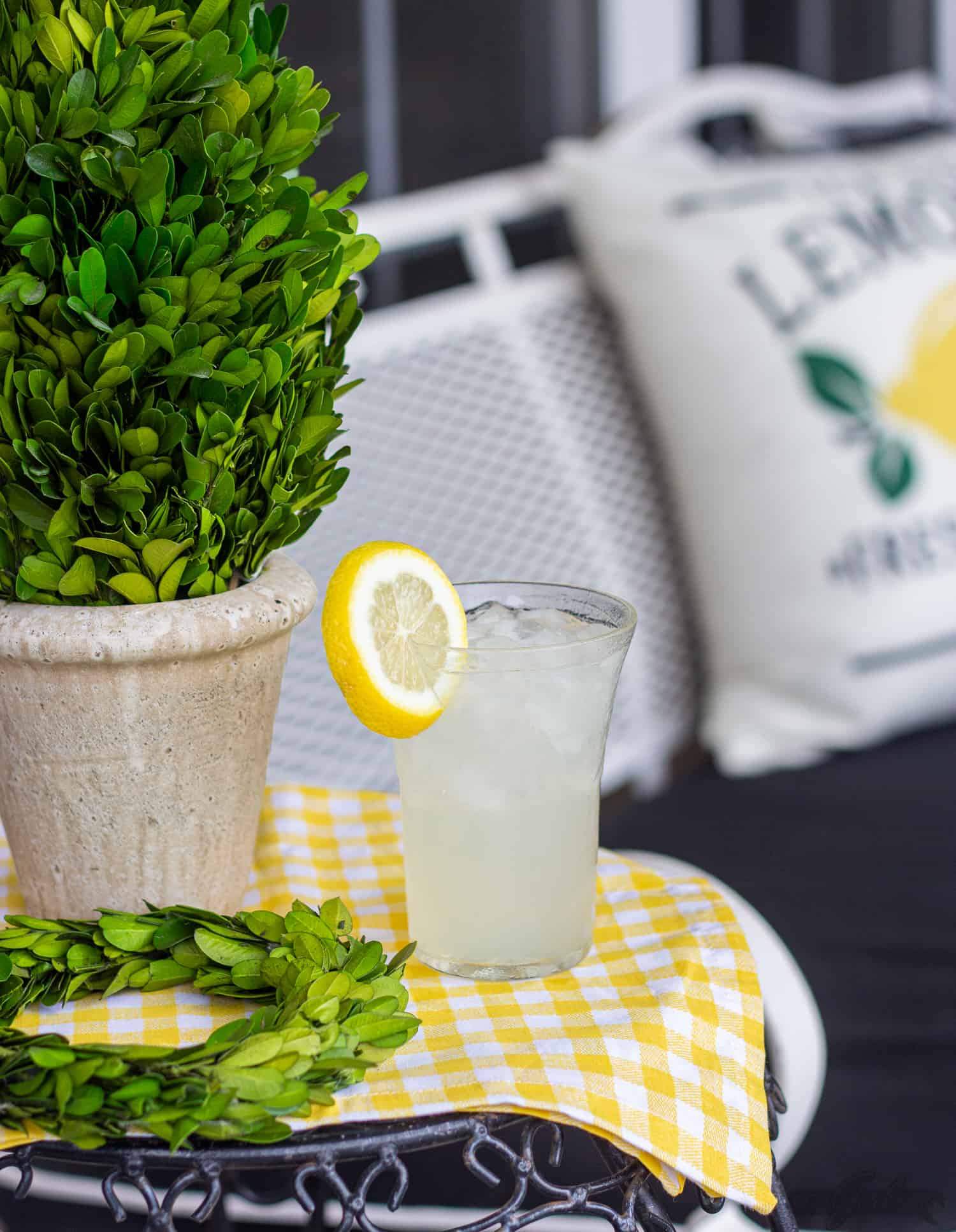 lemonade on a side table on a front porch