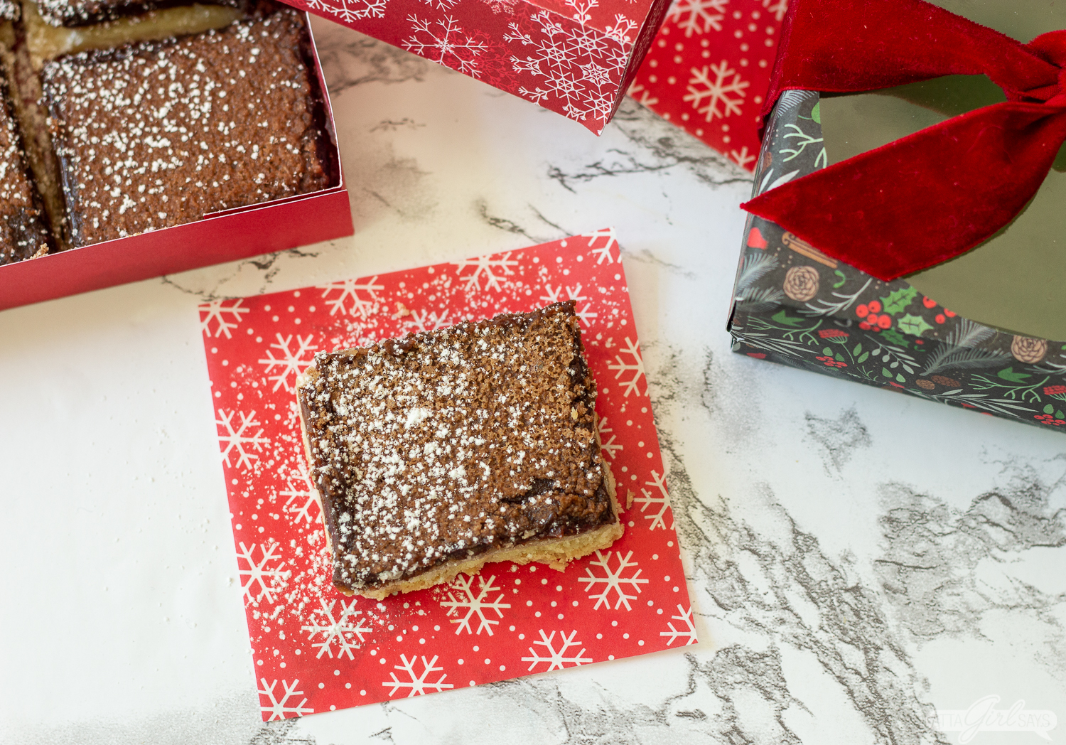 chocolate chess pie bar on a snowflake napkin