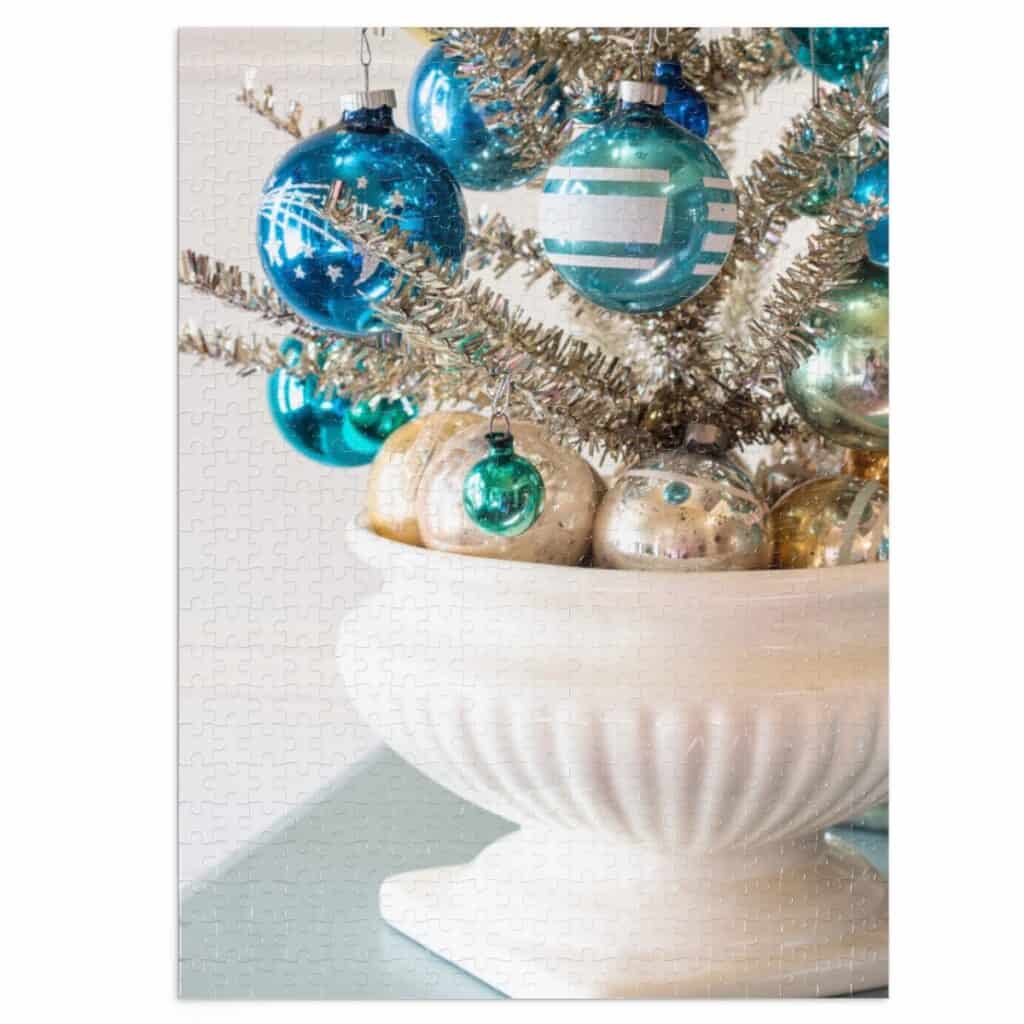 puzzle of silver tinsel tree decorated with blue Shiny Brite ornaments