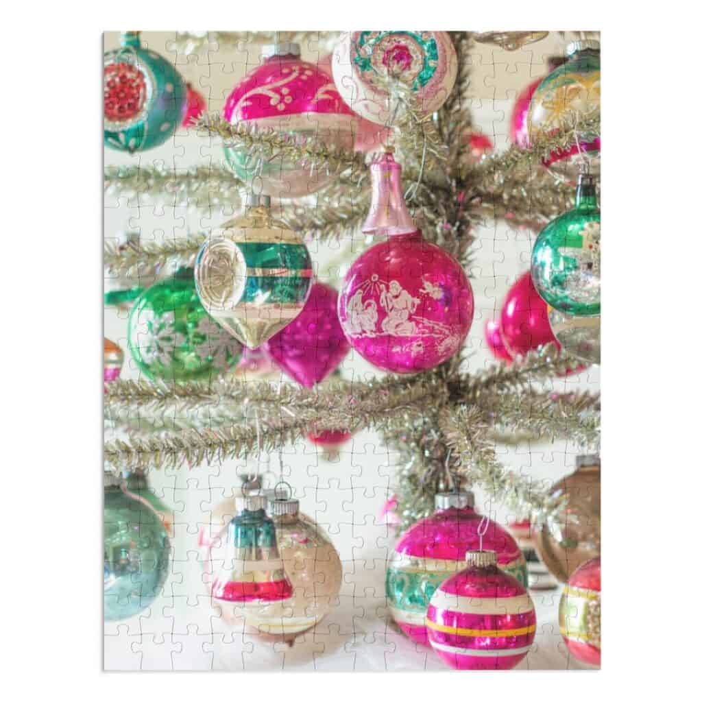 puzzle of pink and green ornaments on a tinsel tree