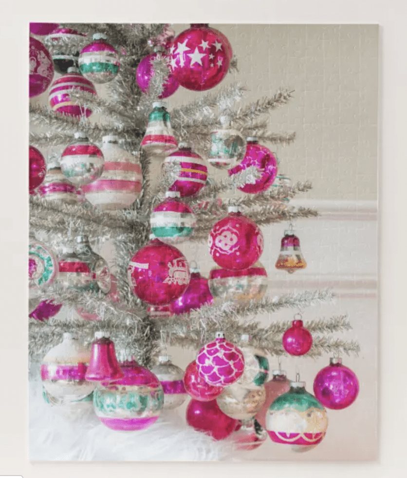 pink shiny brite ornaments on a silver tinsel tree