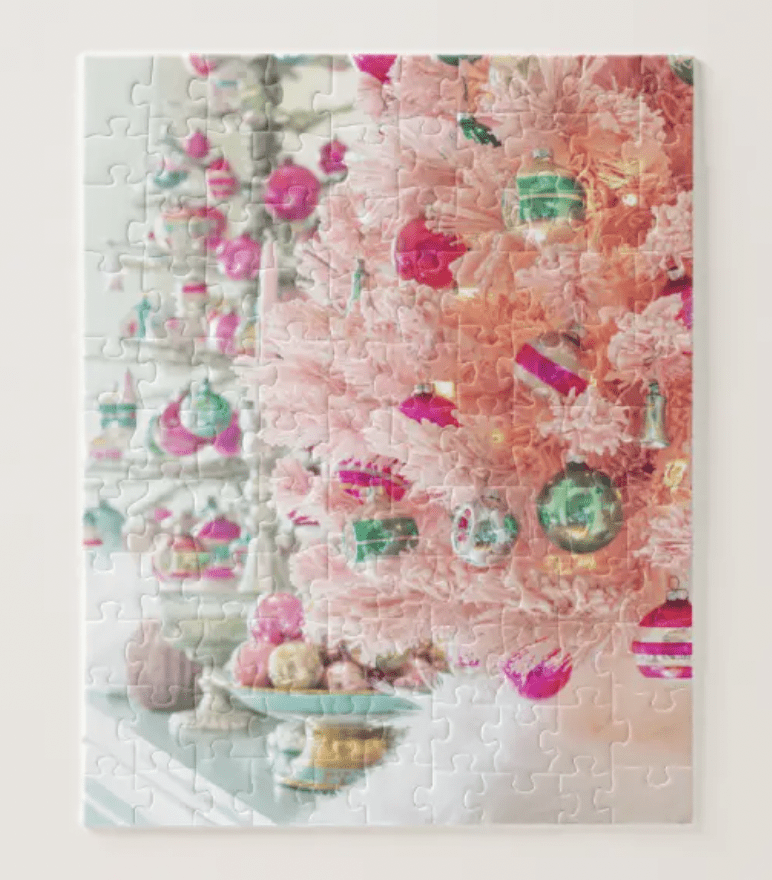 pink flocked tree decorated with vintage Christmas ornaments