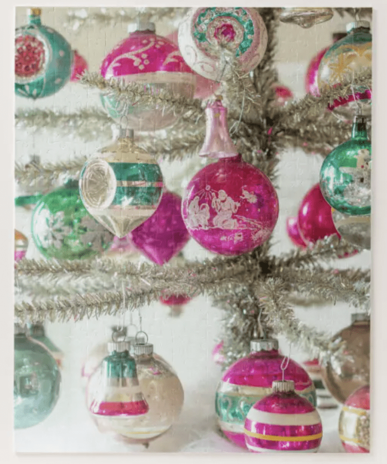 pink and green shiny brite ornaments on a silver tinsel tree