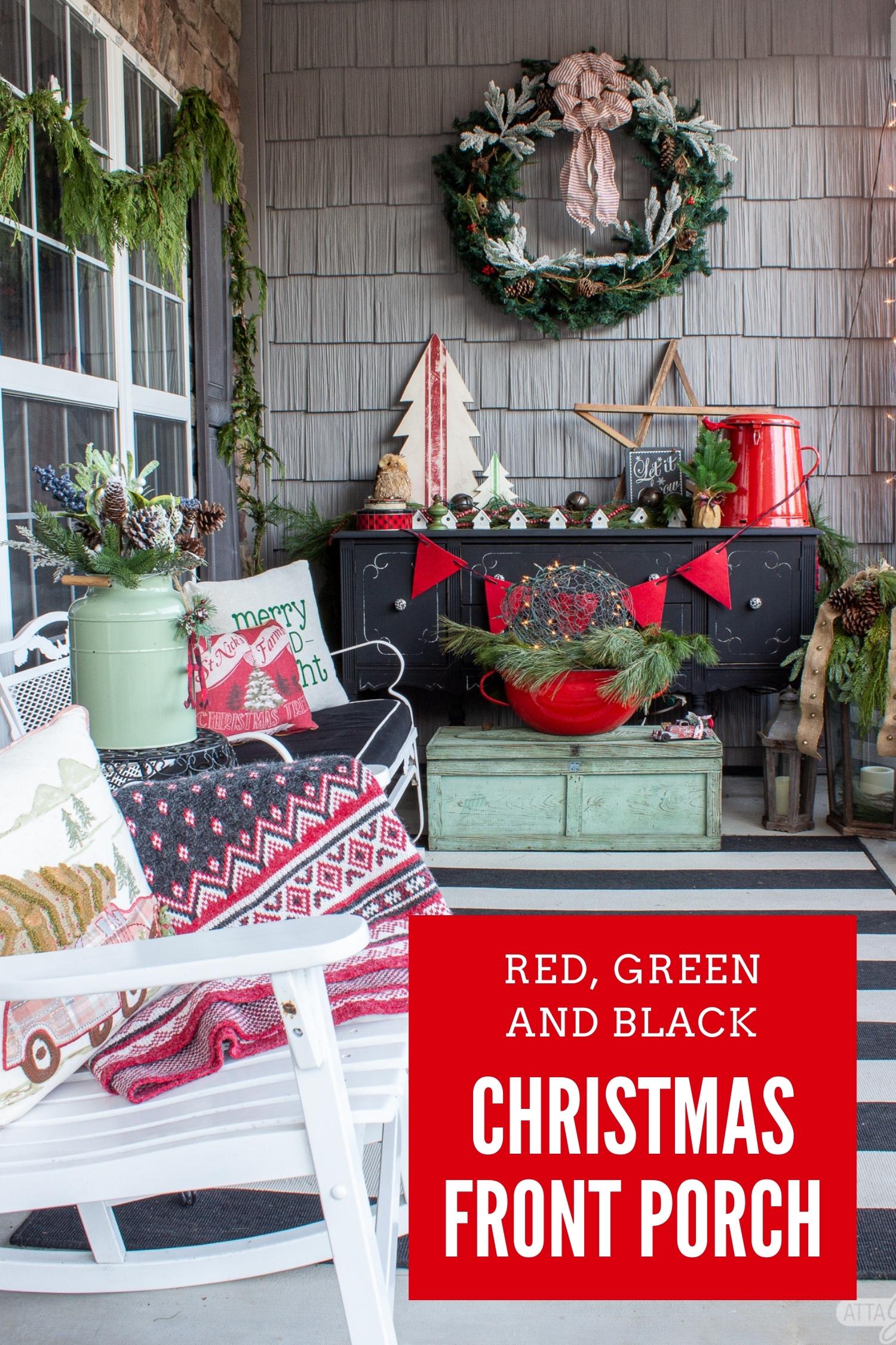 black buffet decorated on a Christmas front porch