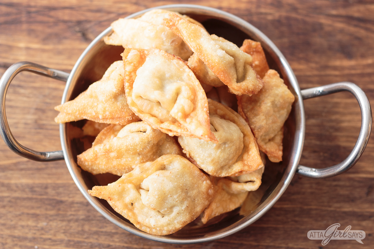 pork fried wontons in a metal bowl
