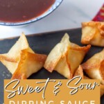 crab rangoons with bowl of sweet and sour sauce