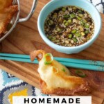 ffried cream cheese wonton with chopsticks and dipping sauce