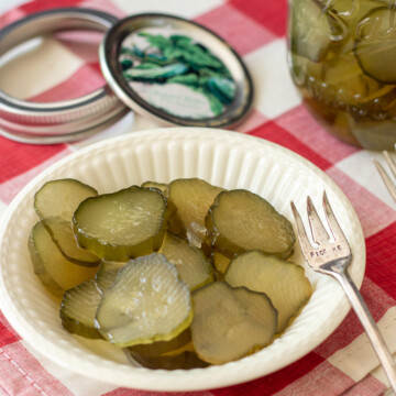 bowl and jar of 14-day sweet pickles