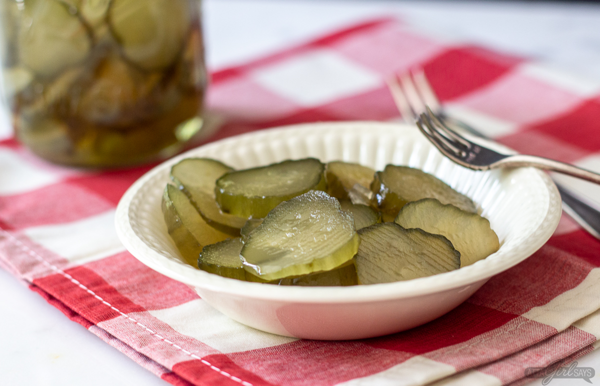 14-day sweet pickles in an ironstone bowl on a gingham napkin