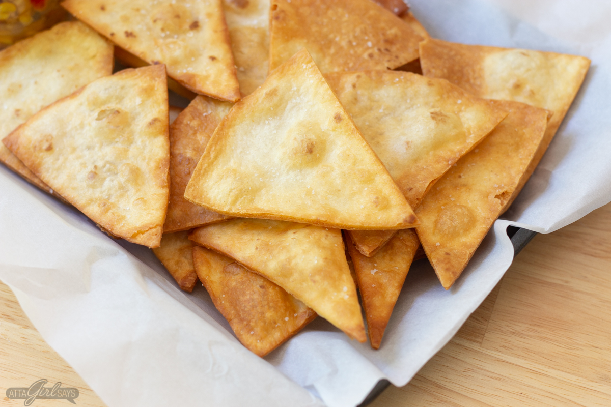 flour tortilla chips with sea salt on parchment
