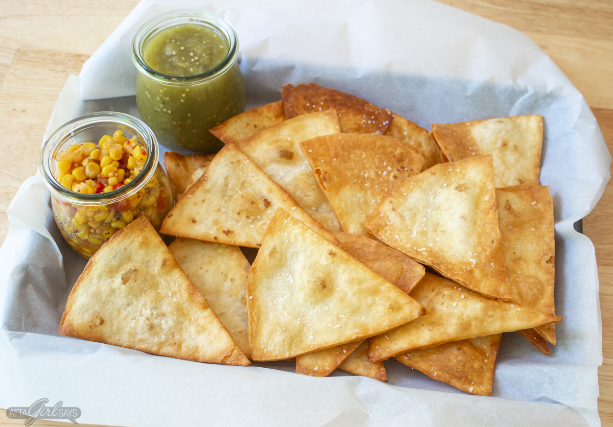 homemade tortilla chips with corn salsa and salsa verde