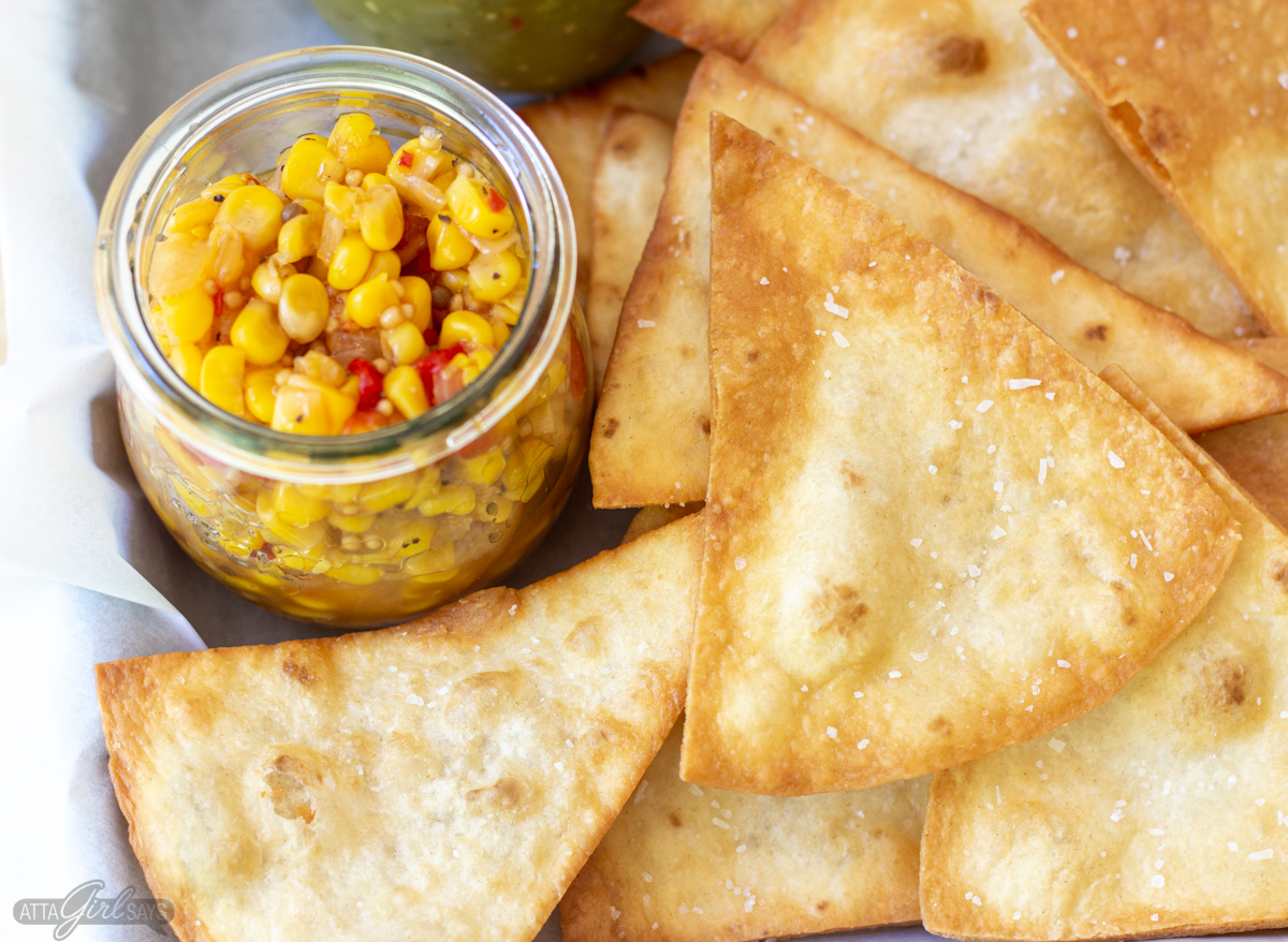 flour tortilla chips with corn salsa