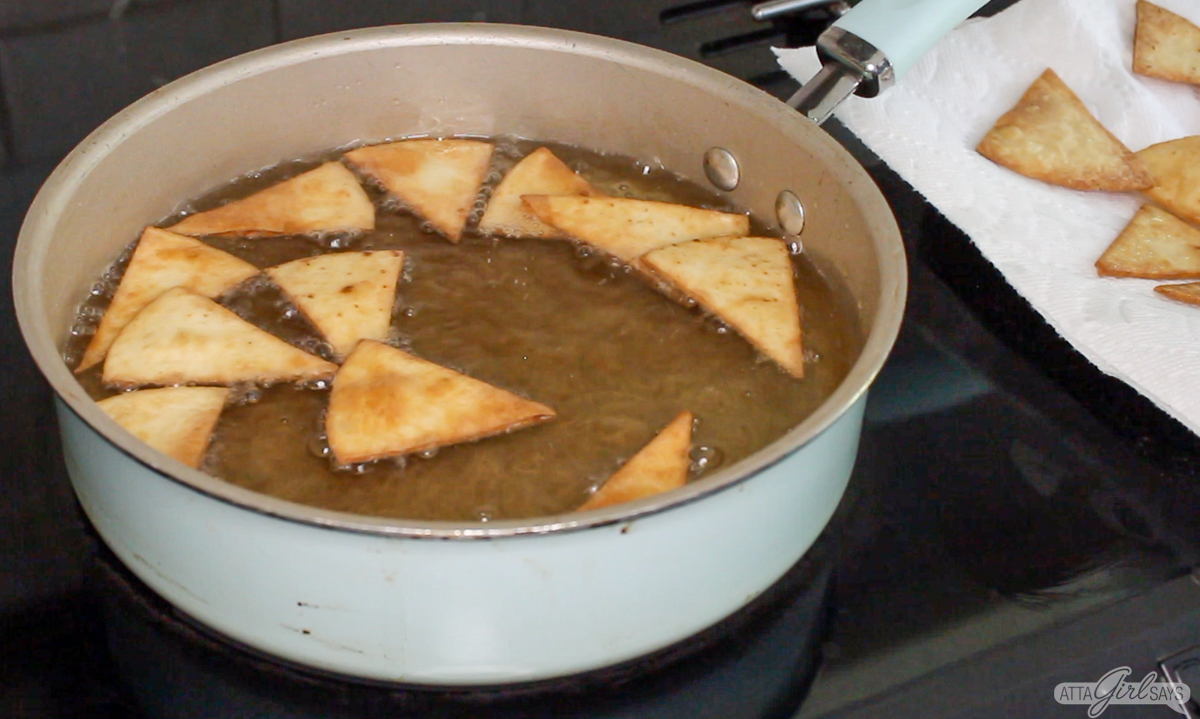 Homemade Tortilla Chips frying in oil