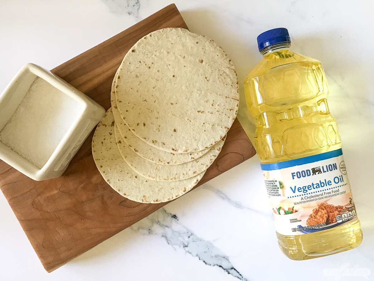 flour tortillas, salt and vegetable oil on a kitchen countertop