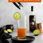 adding dry ice to a dark and stormy cocktail for Halloween