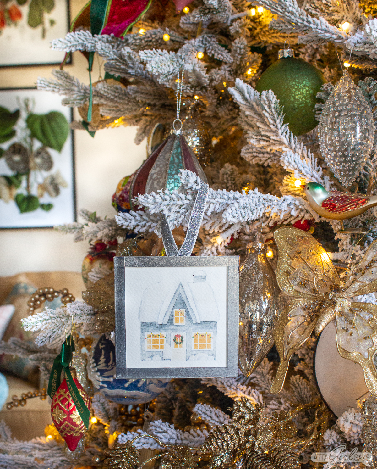 watercolor painting ornament on a flocked tree