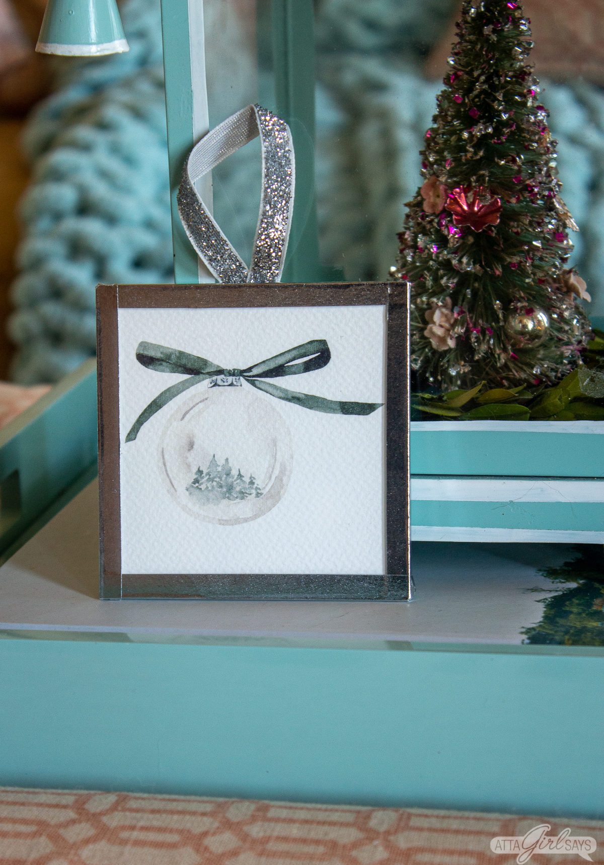 watercolor painting of a Christmas ornament under acrylic with silver foil tape