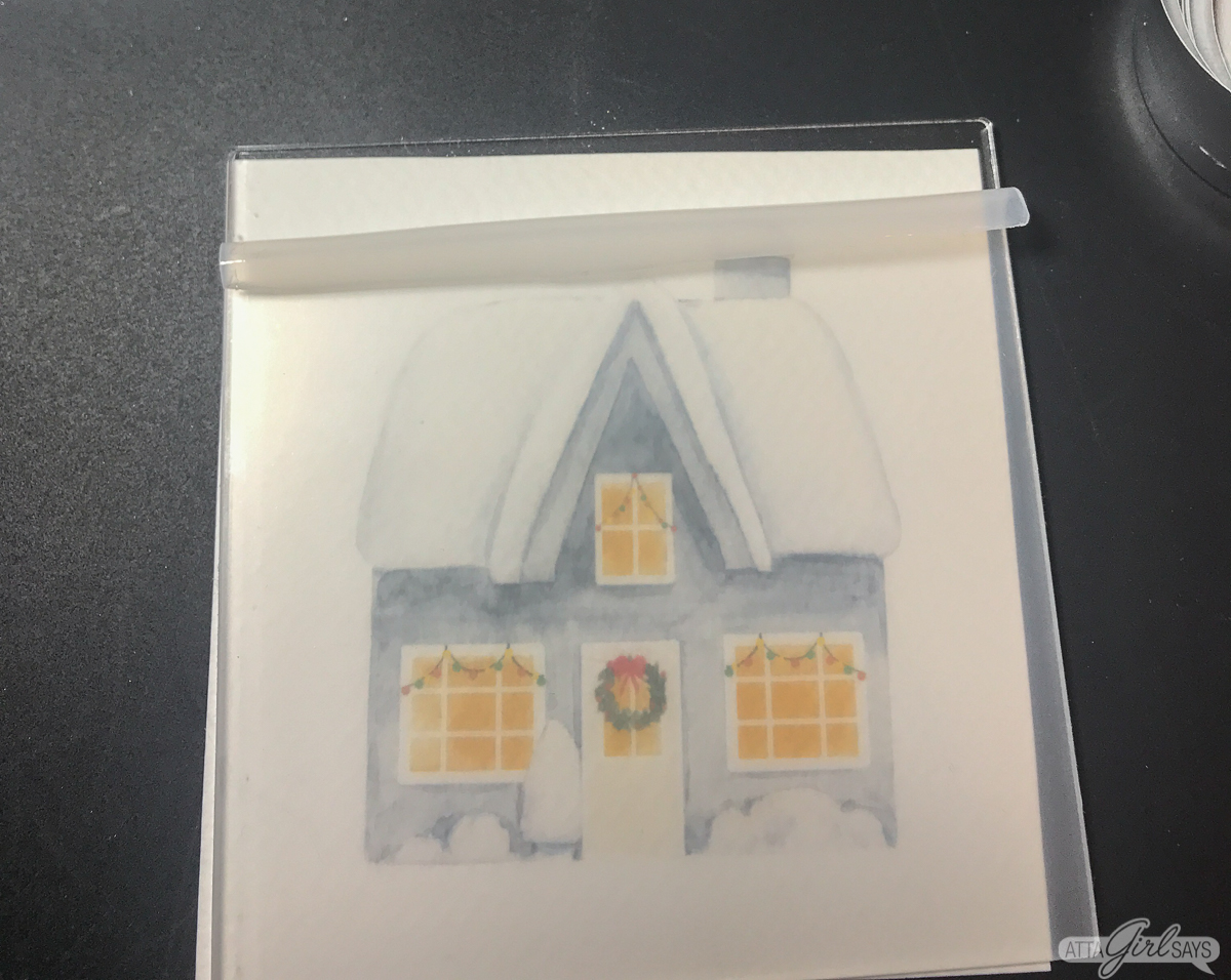 Christmas watercolor behind an acrylic square