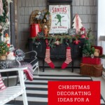 black buffet on a front porch decorated with rustic red and green Christmas decorations