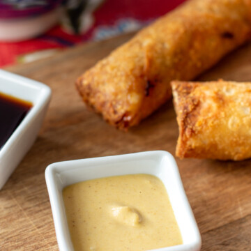 homemade Chinese hot mustard with fried egg rolls