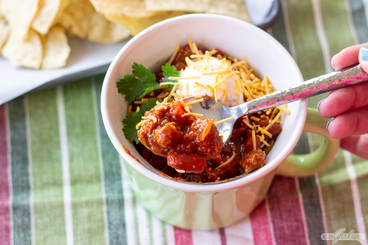 spoon in a bowl of sweet southern chili
