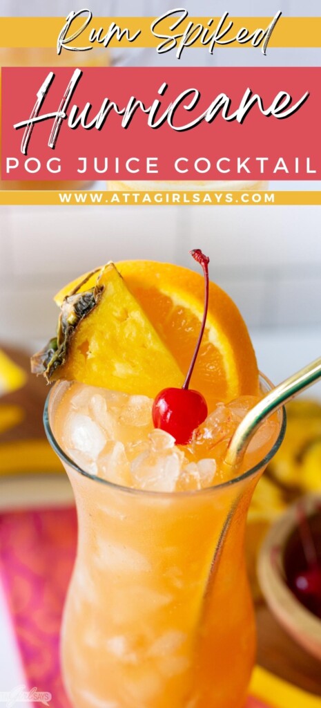 hurricane cocktail in a glass with orange slice, pineapple slice and cherry