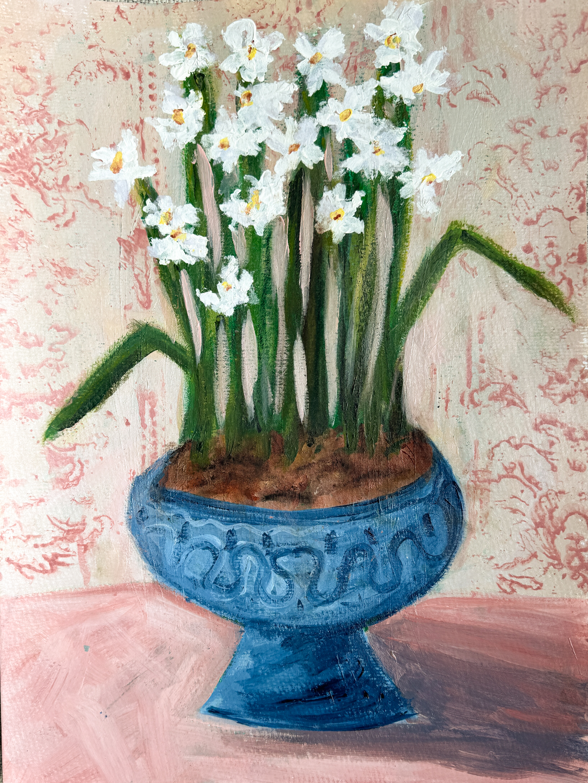 collage painting of white paperwhite flowers in a blue compote against a textured blush wallpaper
