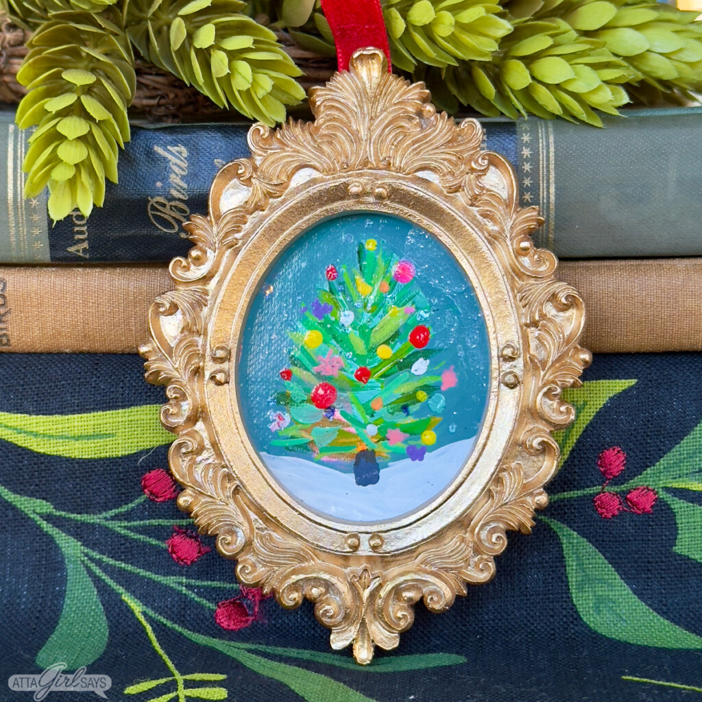 mini impressionistic Christmas tree painting in a gold frame