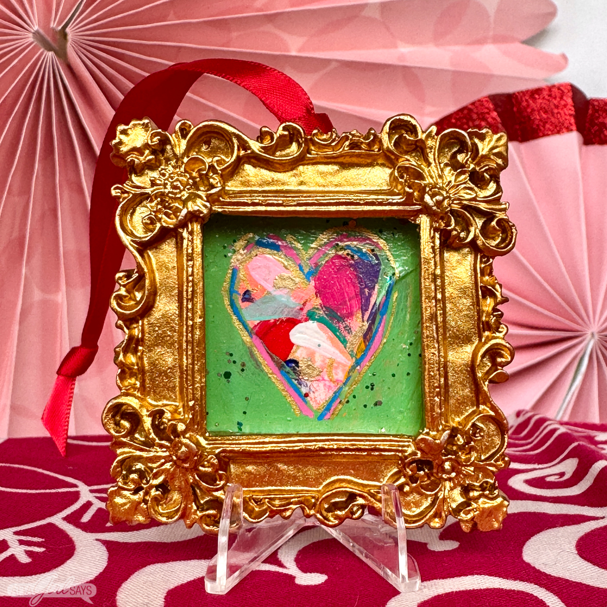 mini heart painting in gold  resin frame